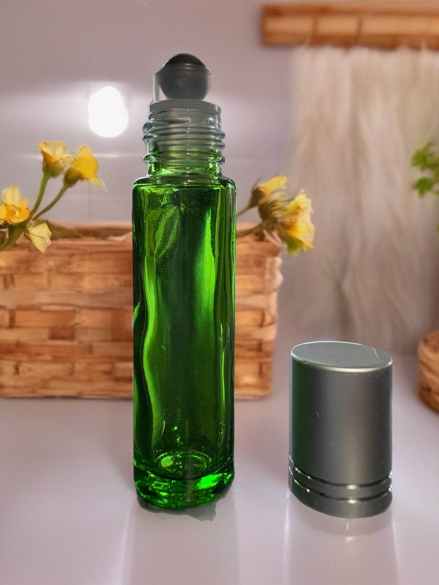 10mL Rollerball Glass Bottle with silver coloured cover. Variants pink, blue, or green.